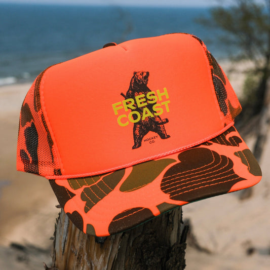 FRESH COAST HOCKEY CO. Backwoods Blaze Camo Trucker Snapback Hat: Orange