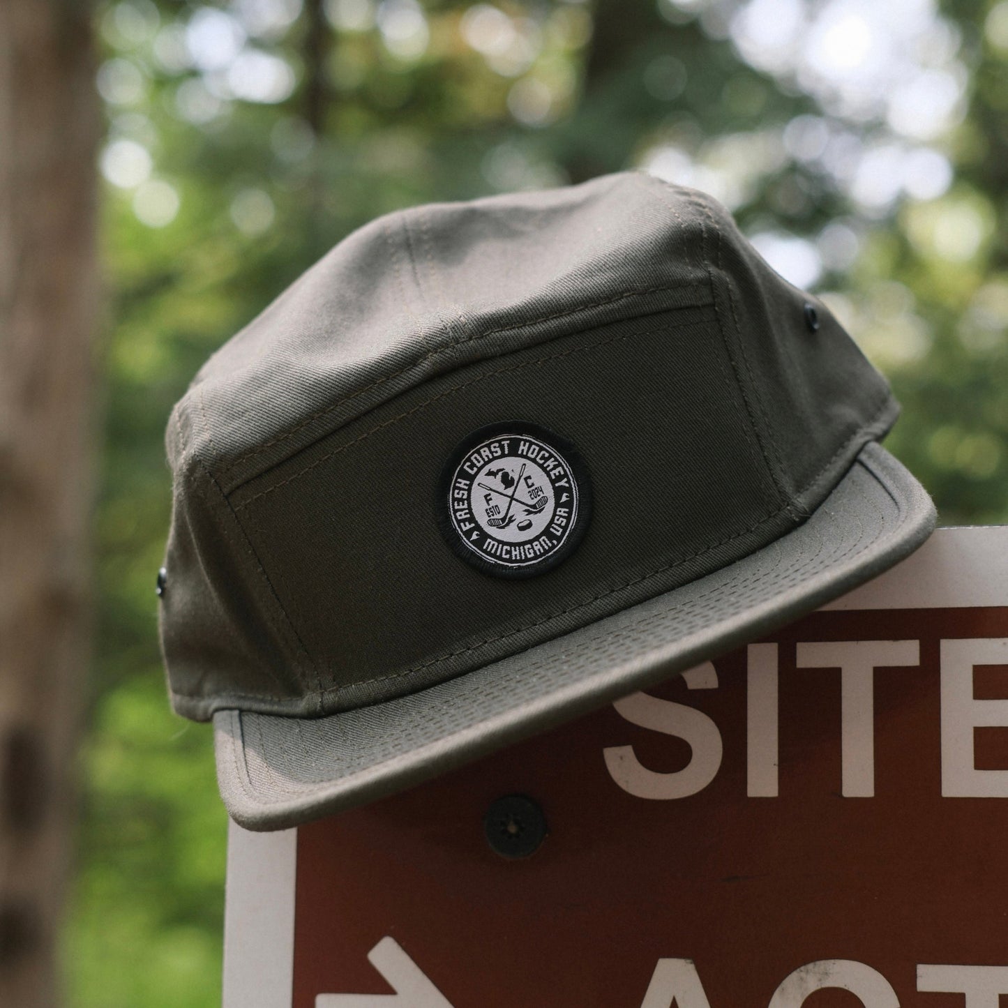FRESH COAST HOCKEY CO. Badge Patch Camper Hat: Dark Olive Green